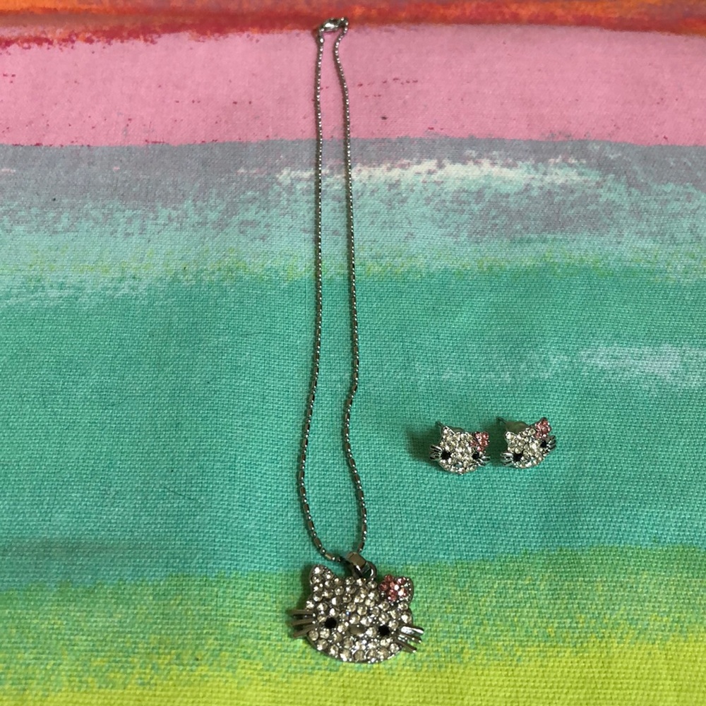Brand new Hello Kitty Necklace and earrings set